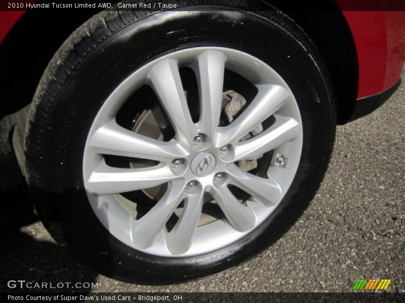 Garnet Red / Taupe 2010 Hyundai Tucson Limited AWD