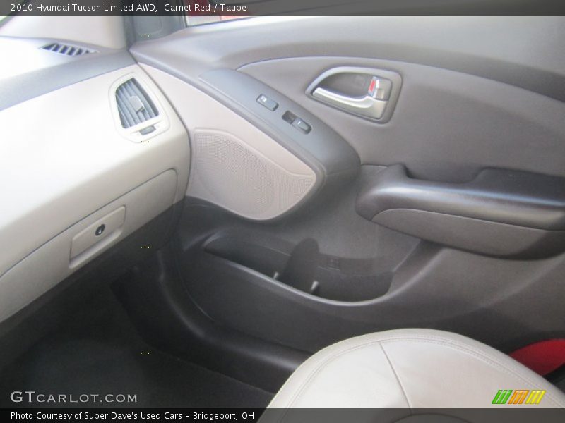 Garnet Red / Taupe 2010 Hyundai Tucson Limited AWD