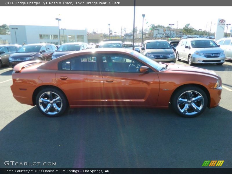 Toxic Orange Pearl / Black 2011 Dodge Charger R/T Road & Track