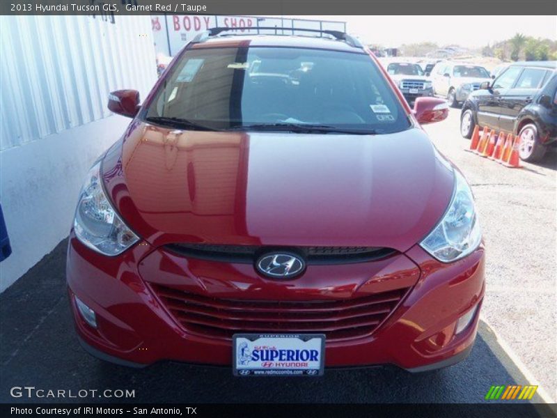 Garnet Red / Taupe 2013 Hyundai Tucson GLS