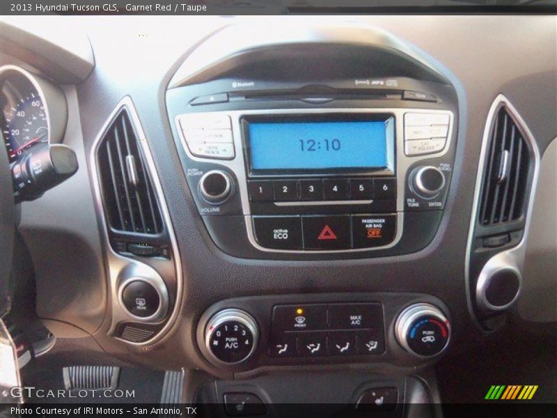 Garnet Red / Taupe 2013 Hyundai Tucson GLS