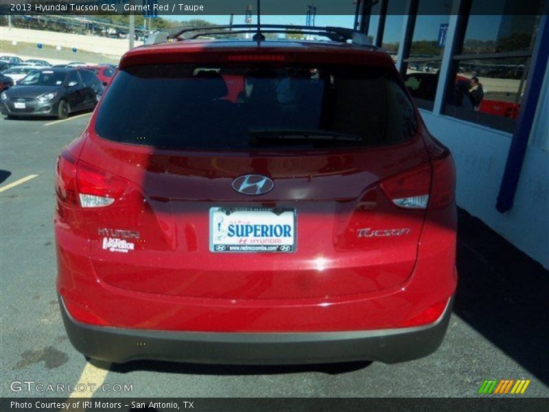 Garnet Red / Taupe 2013 Hyundai Tucson GLS