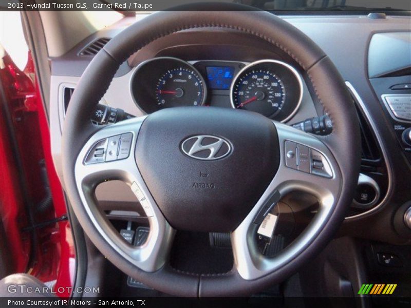 Garnet Red / Taupe 2013 Hyundai Tucson GLS