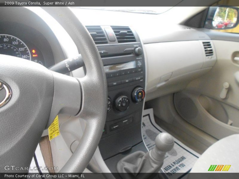 Super White / Ash 2009 Toyota Corolla