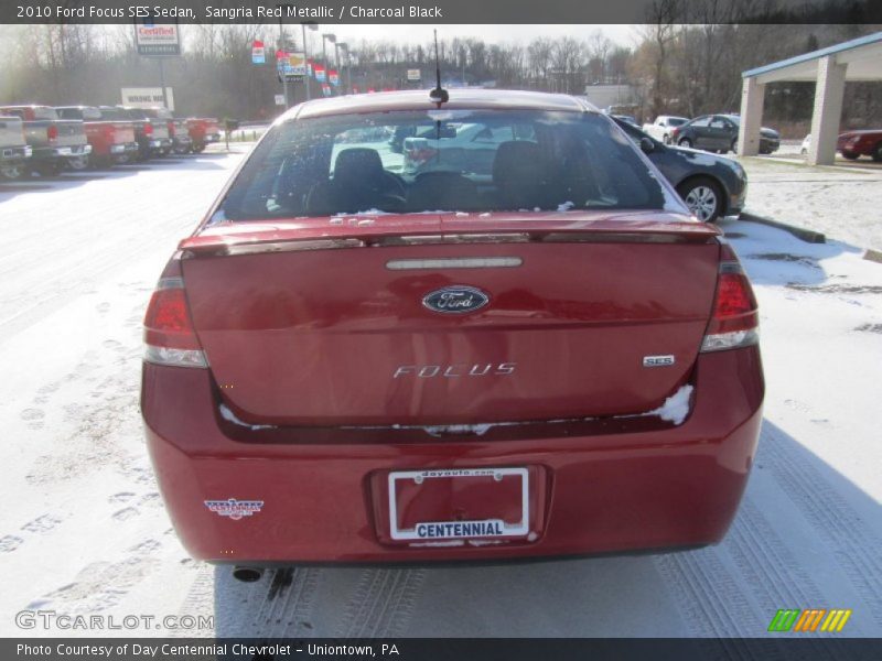 Sangria Red Metallic / Charcoal Black 2010 Ford Focus SES Sedan