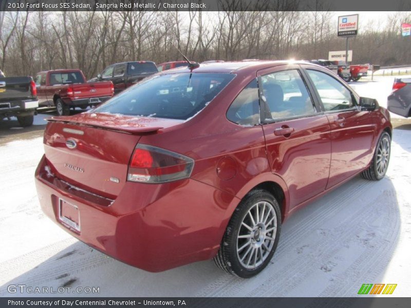 Sangria Red Metallic / Charcoal Black 2010 Ford Focus SES Sedan