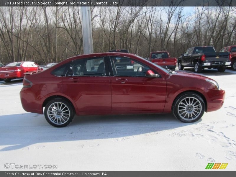 Sangria Red Metallic / Charcoal Black 2010 Ford Focus SES Sedan