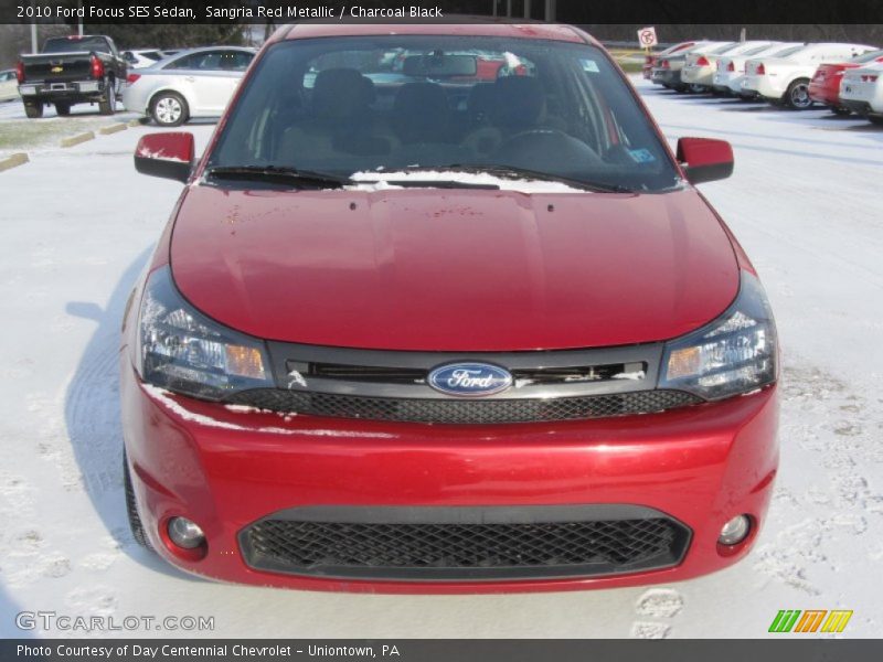 Sangria Red Metallic / Charcoal Black 2010 Ford Focus SES Sedan