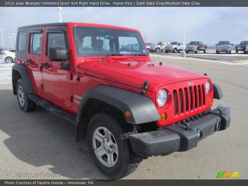 Front 3/4 View of 2010 Wrangler Unlimited Sport 4x4 Right Hand Drive