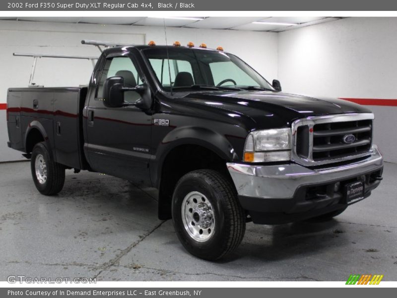Front 3/4 View of 2002 F350 Super Duty XLT Regular Cab 4x4