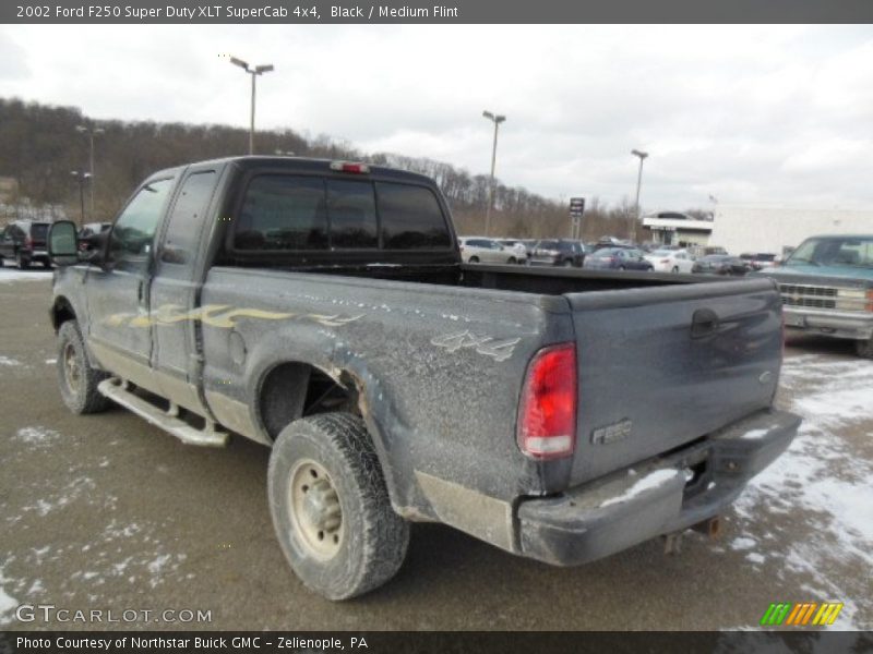 Black / Medium Flint 2002 Ford F250 Super Duty XLT SuperCab 4x4
