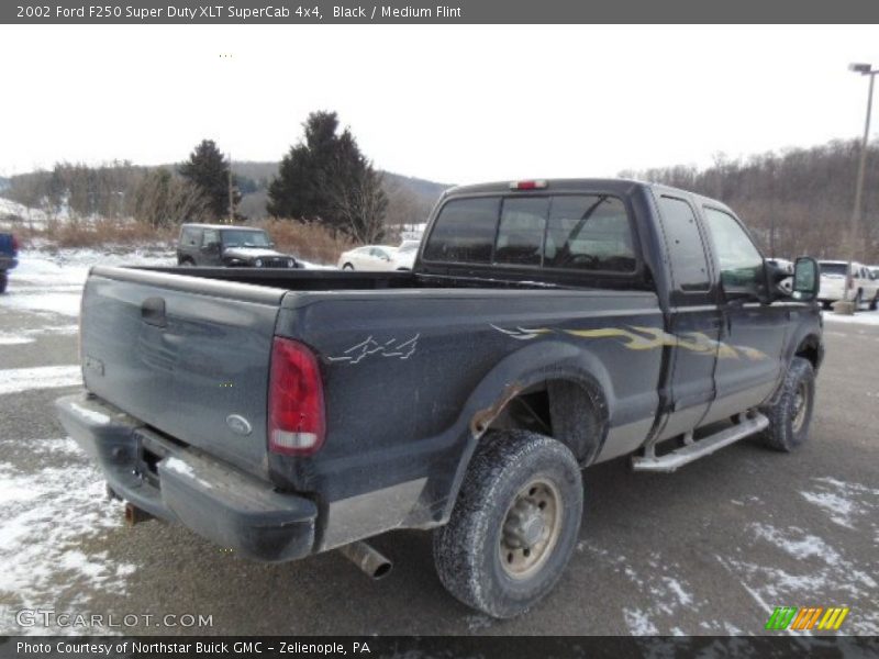 Black / Medium Flint 2002 Ford F250 Super Duty XLT SuperCab 4x4