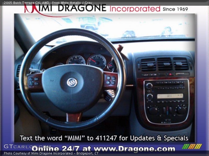 Frost White Metallic / Gray 2005 Buick Terraza CXL AWD