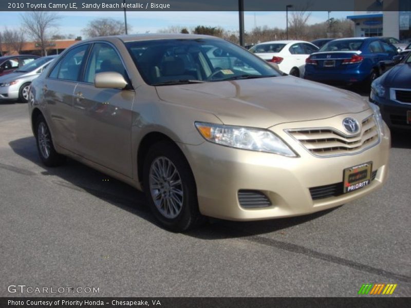 Sandy Beach Metallic / Bisque 2010 Toyota Camry LE