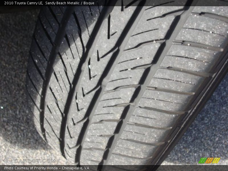 Sandy Beach Metallic / Bisque 2010 Toyota Camry LE