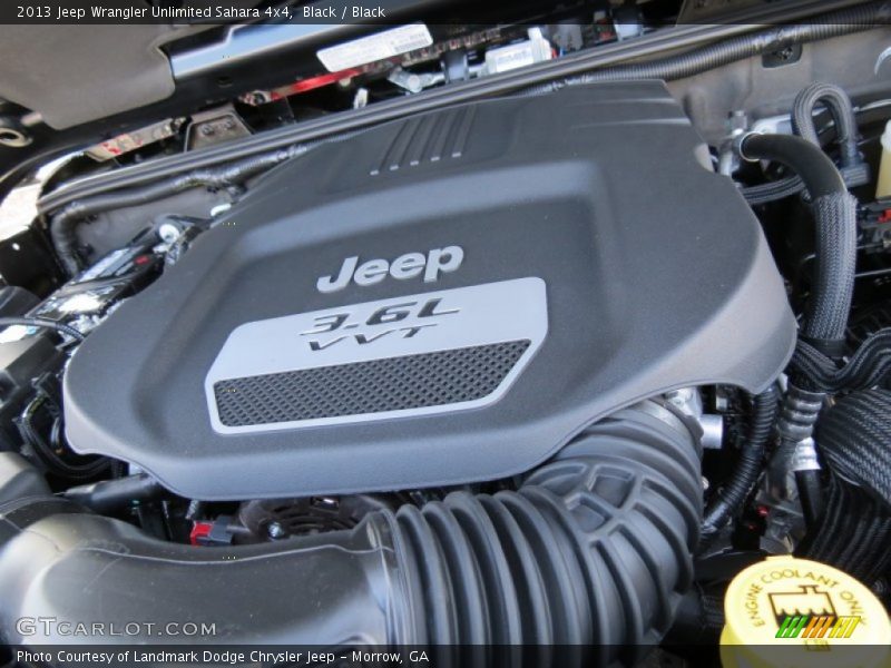 Black / Black 2013 Jeep Wrangler Unlimited Sahara 4x4