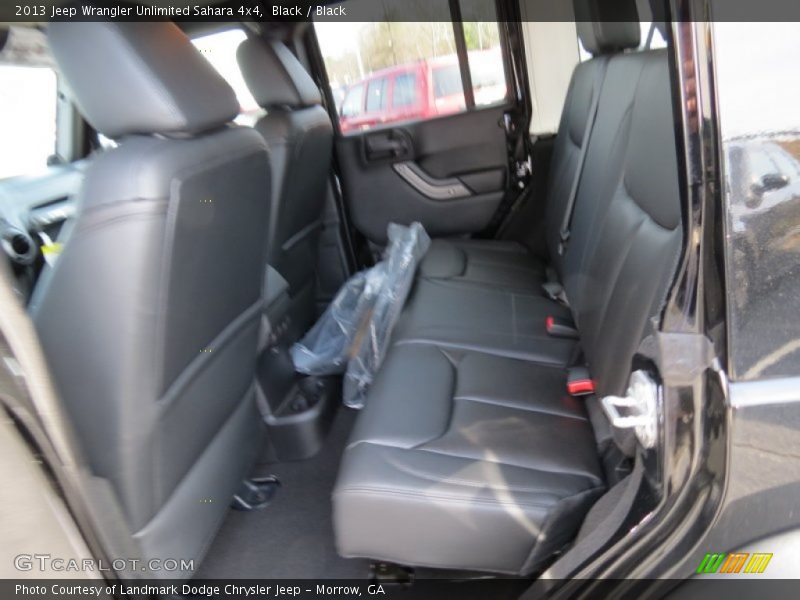 Black / Black 2013 Jeep Wrangler Unlimited Sahara 4x4