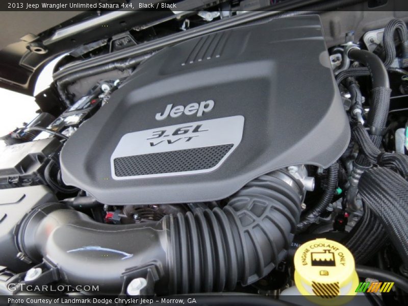 Black / Black 2013 Jeep Wrangler Unlimited Sahara 4x4
