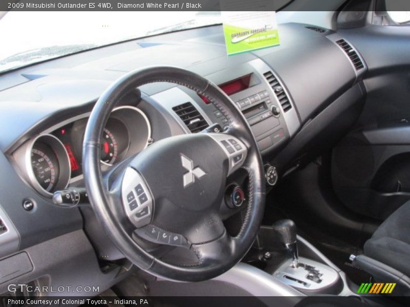 Dashboard of 2009 Outlander ES 4WD