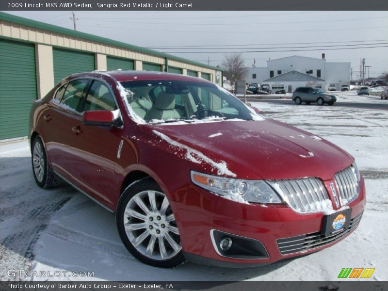 Sangria Red Metallic / Light Camel 2009 Lincoln MKS AWD Sedan