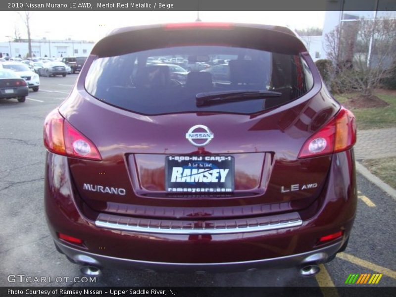 Merlot Red Metallic / Beige 2010 Nissan Murano LE AWD