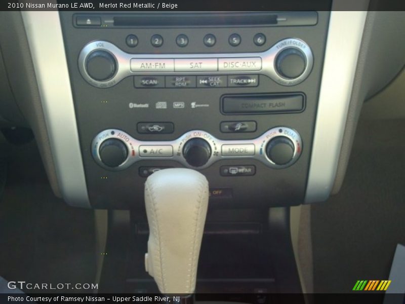 Merlot Red Metallic / Beige 2010 Nissan Murano LE AWD