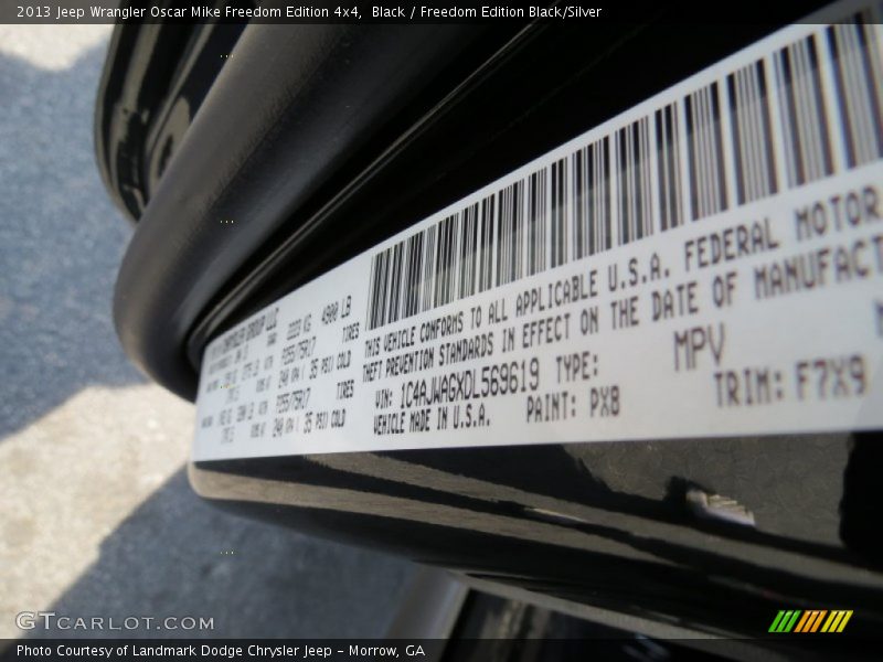 Black / Freedom Edition Black/Silver 2013 Jeep Wrangler Oscar Mike Freedom Edition 4x4