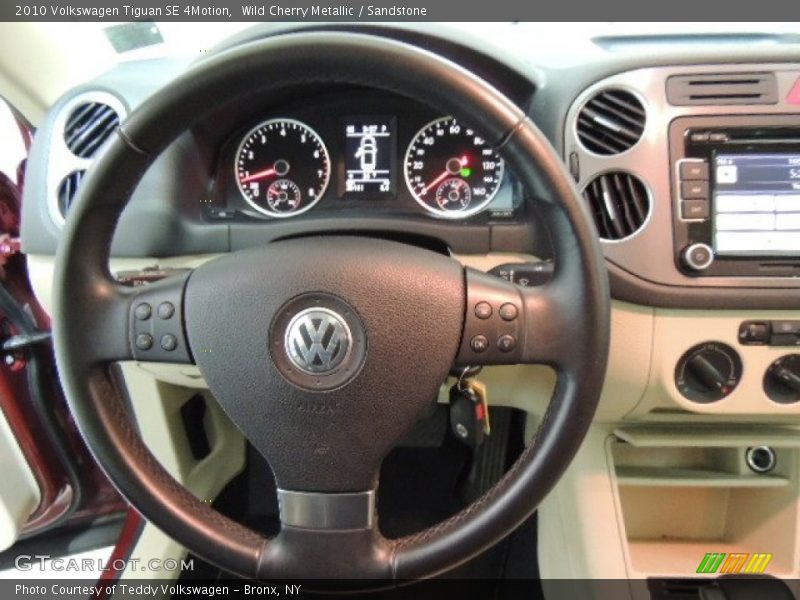 Wild Cherry Metallic / Sandstone 2010 Volkswagen Tiguan SE 4Motion