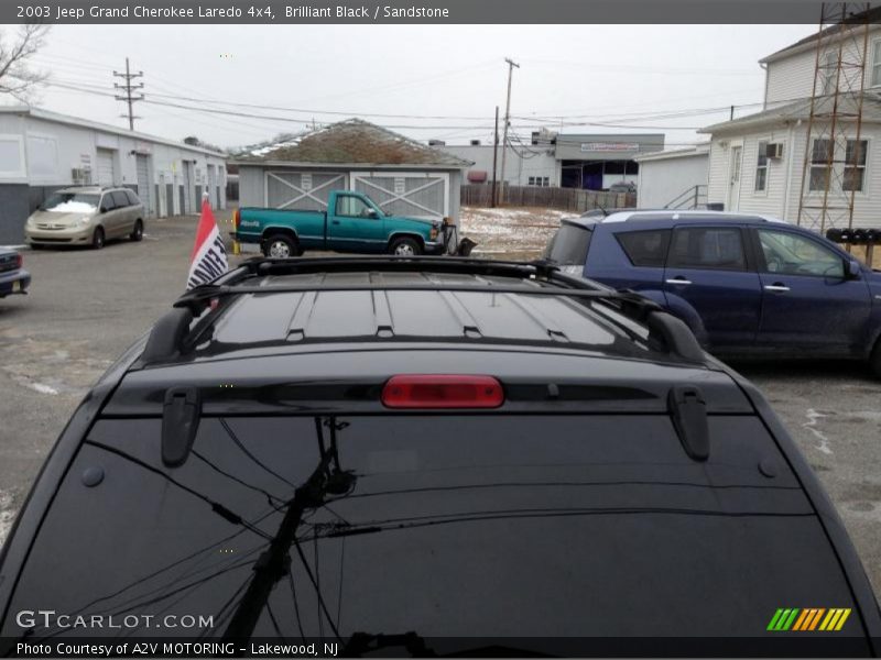 Brilliant Black / Sandstone 2003 Jeep Grand Cherokee Laredo 4x4