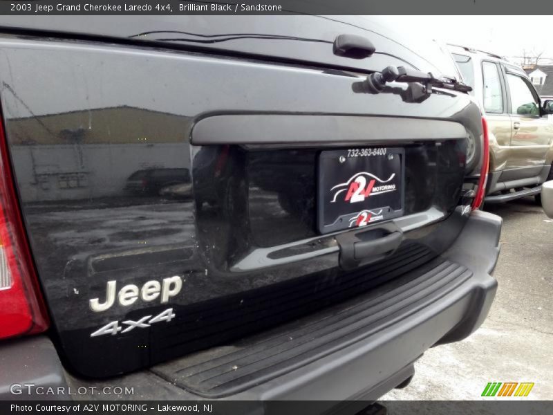 Brilliant Black / Sandstone 2003 Jeep Grand Cherokee Laredo 4x4
