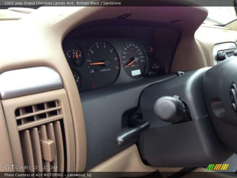 Brilliant Black / Sandstone 2003 Jeep Grand Cherokee Laredo 4x4
