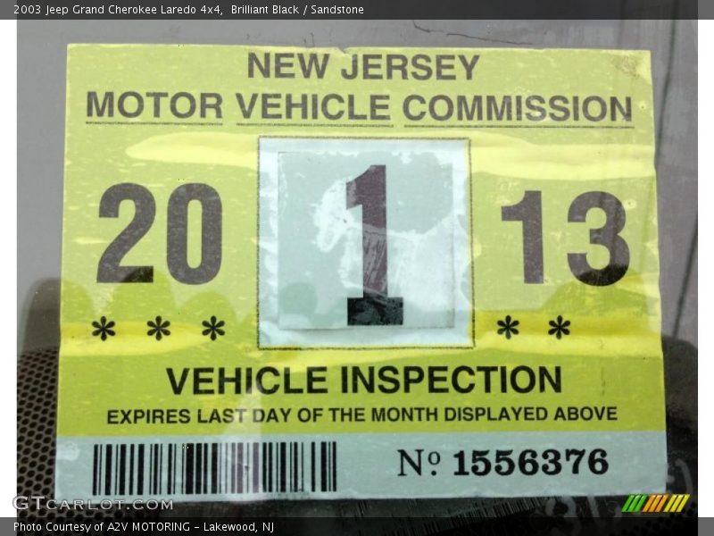 Brilliant Black / Sandstone 2003 Jeep Grand Cherokee Laredo 4x4