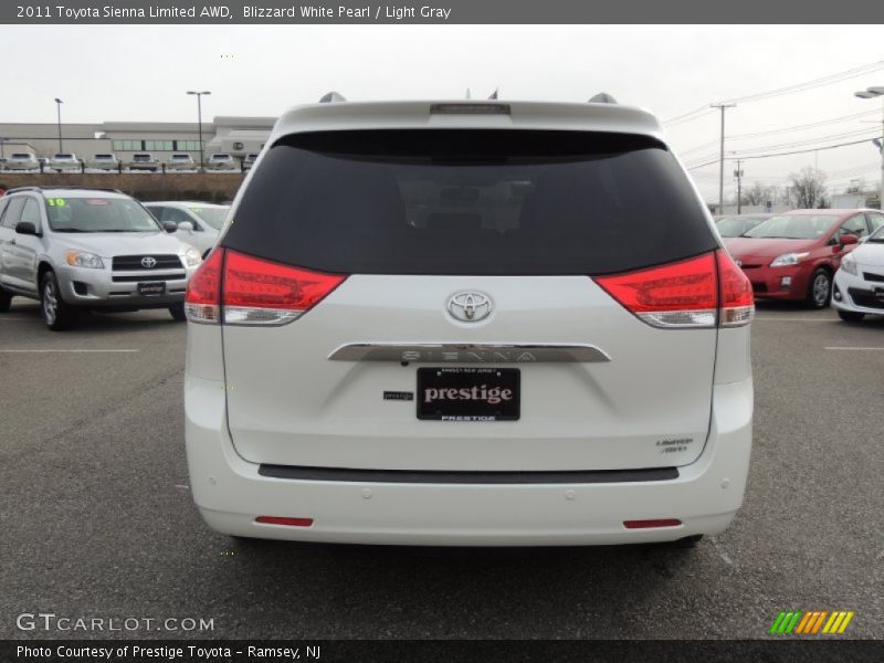 Blizzard White Pearl / Light Gray 2011 Toyota Sienna Limited AWD