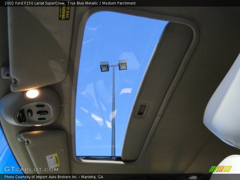 True Blue Metallic / Medium Parchment 2002 Ford F150 Lariat SuperCrew