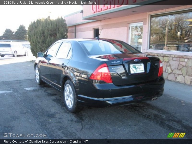 Atlantis Green Metallic / Medium Light Stone 2010 Ford Fusion SE