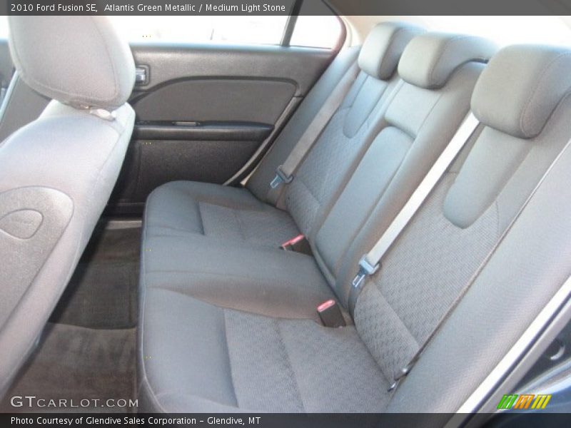 Atlantis Green Metallic / Medium Light Stone 2010 Ford Fusion SE