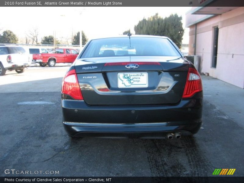 Atlantis Green Metallic / Medium Light Stone 2010 Ford Fusion SE