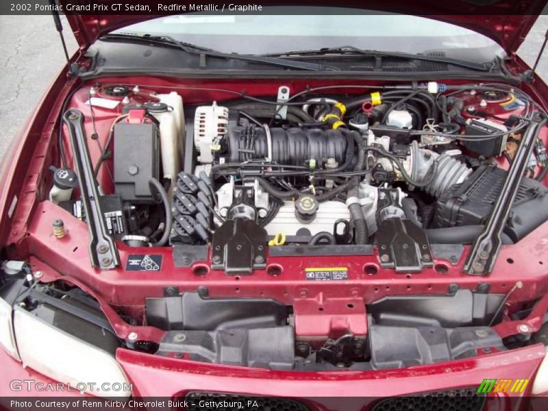Redfire Metallic / Graphite 2002 Pontiac Grand Prix GT Sedan