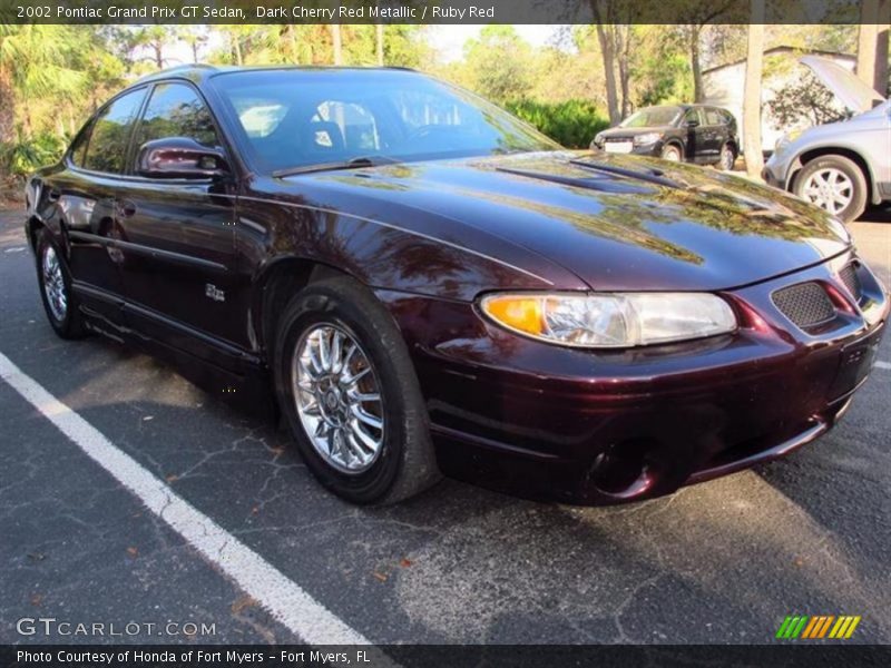 Dark Cherry Red Metallic / Ruby Red 2002 Pontiac Grand Prix GT Sedan