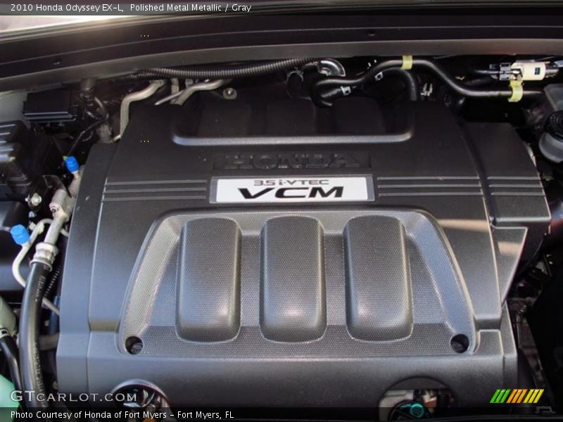 Polished Metal Metallic / Gray 2010 Honda Odyssey EX-L