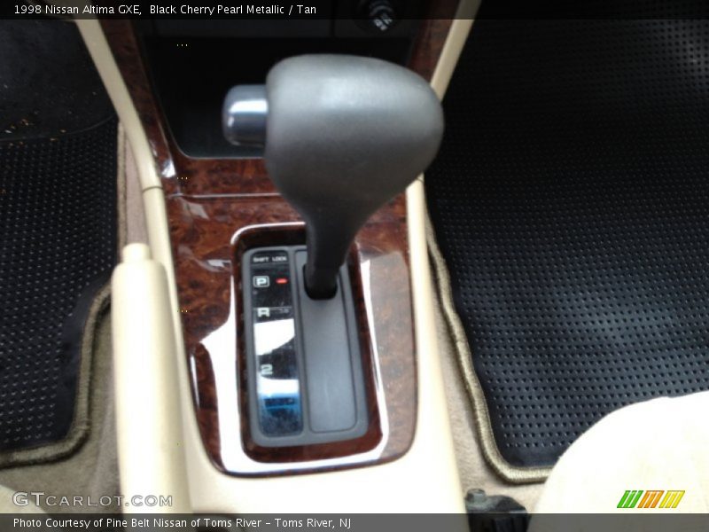 Black Cherry Pearl Metallic / Tan 1998 Nissan Altima GXE