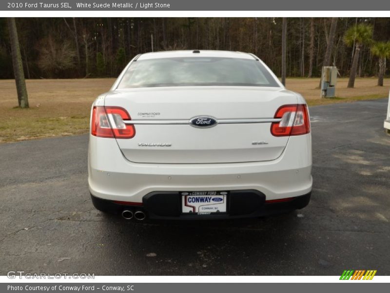 White Suede Metallic / Light Stone 2010 Ford Taurus SEL
