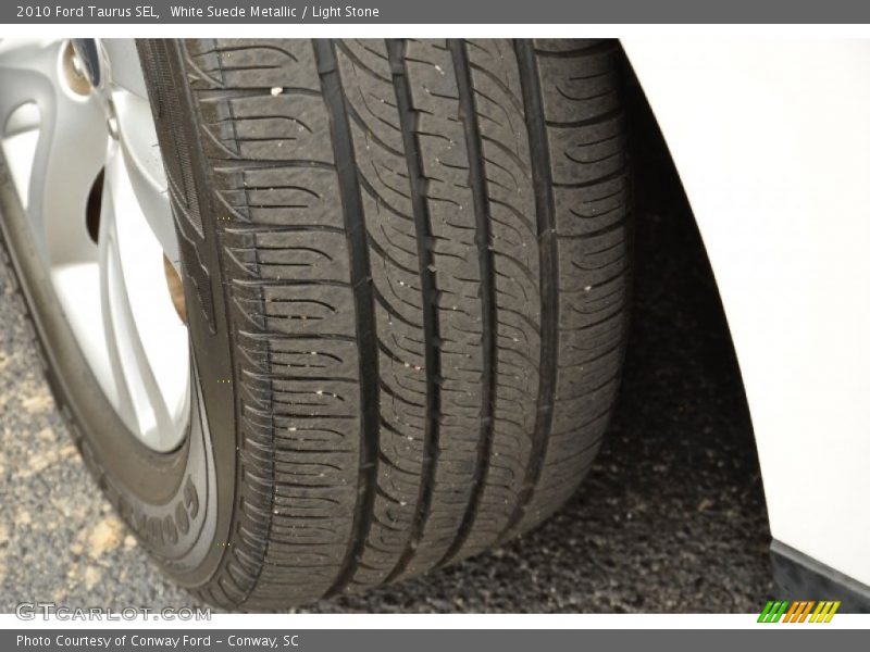 White Suede Metallic / Light Stone 2010 Ford Taurus SEL