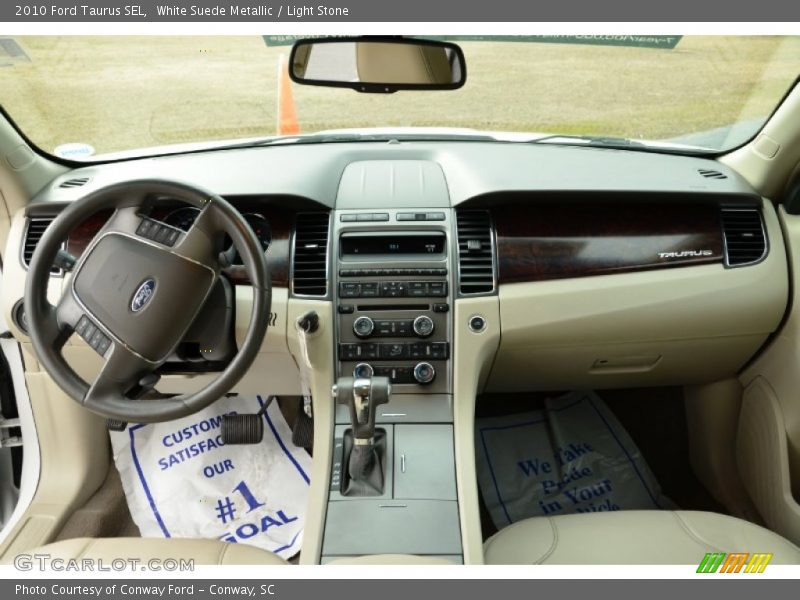 White Suede Metallic / Light Stone 2010 Ford Taurus SEL