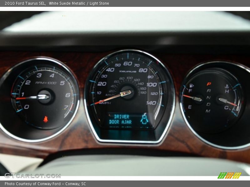 White Suede Metallic / Light Stone 2010 Ford Taurus SEL