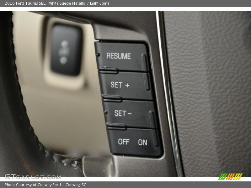 White Suede Metallic / Light Stone 2010 Ford Taurus SEL