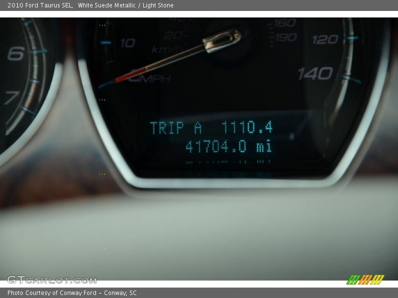 White Suede Metallic / Light Stone 2010 Ford Taurus SEL