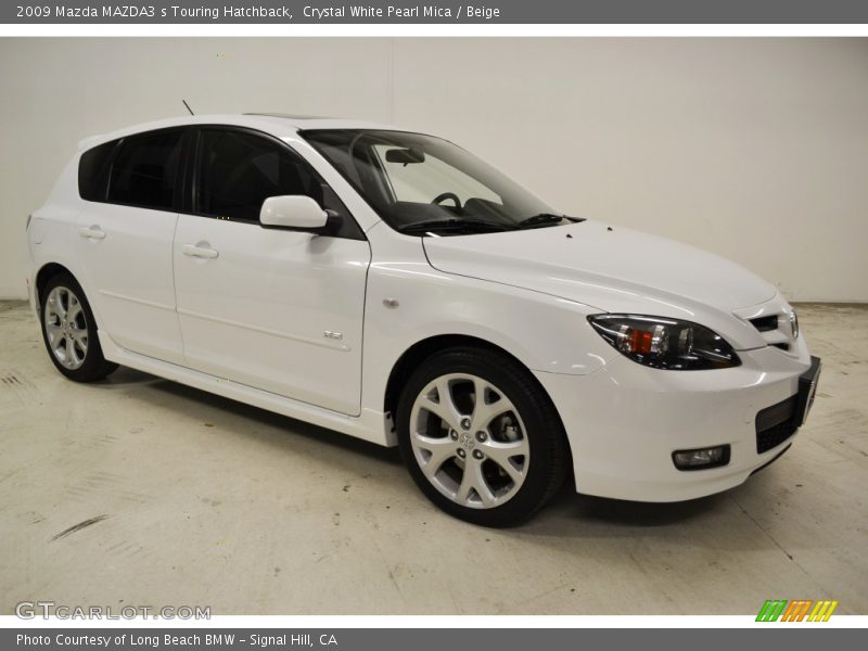 Crystal White Pearl Mica / Beige 2009 Mazda MAZDA3 s Touring Hatchback