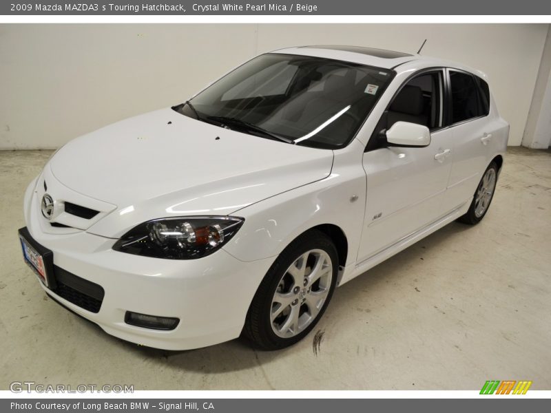 Crystal White Pearl Mica / Beige 2009 Mazda MAZDA3 s Touring Hatchback