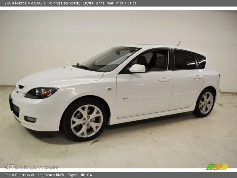 Crystal White Pearl Mica / Beige 2009 Mazda MAZDA3 s Touring Hatchback